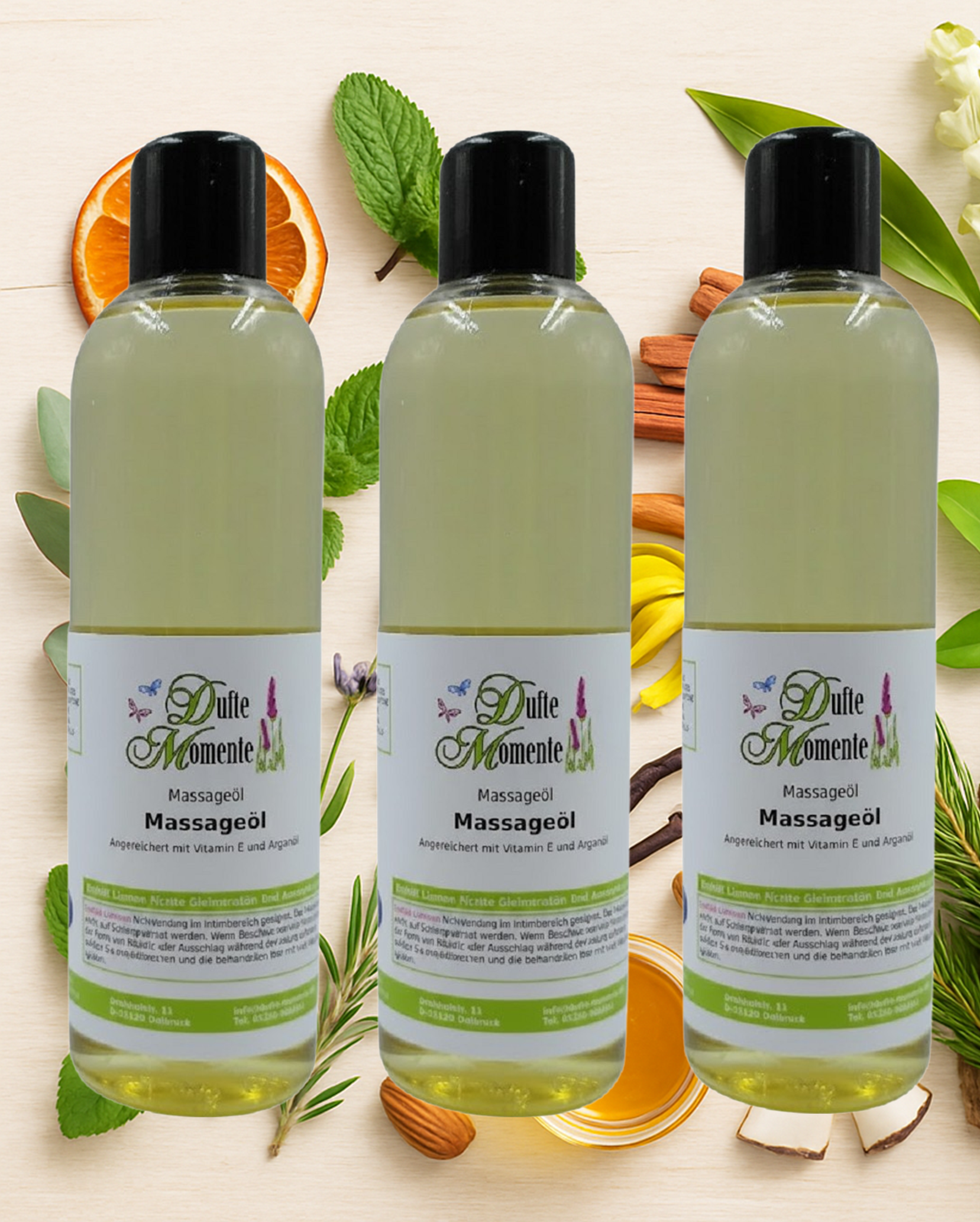 3x250ml Flaschen Massageöl auf Hintergrund mit Duftkomponenten