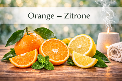Ätherische Ölmischung Orange Zitrone mit Zitrusfrüchten in Wellness Atmosphäre